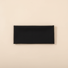 Bandeau Uni Homme Polyester Noir — Packshot fond beige — Les Jolies Têtes